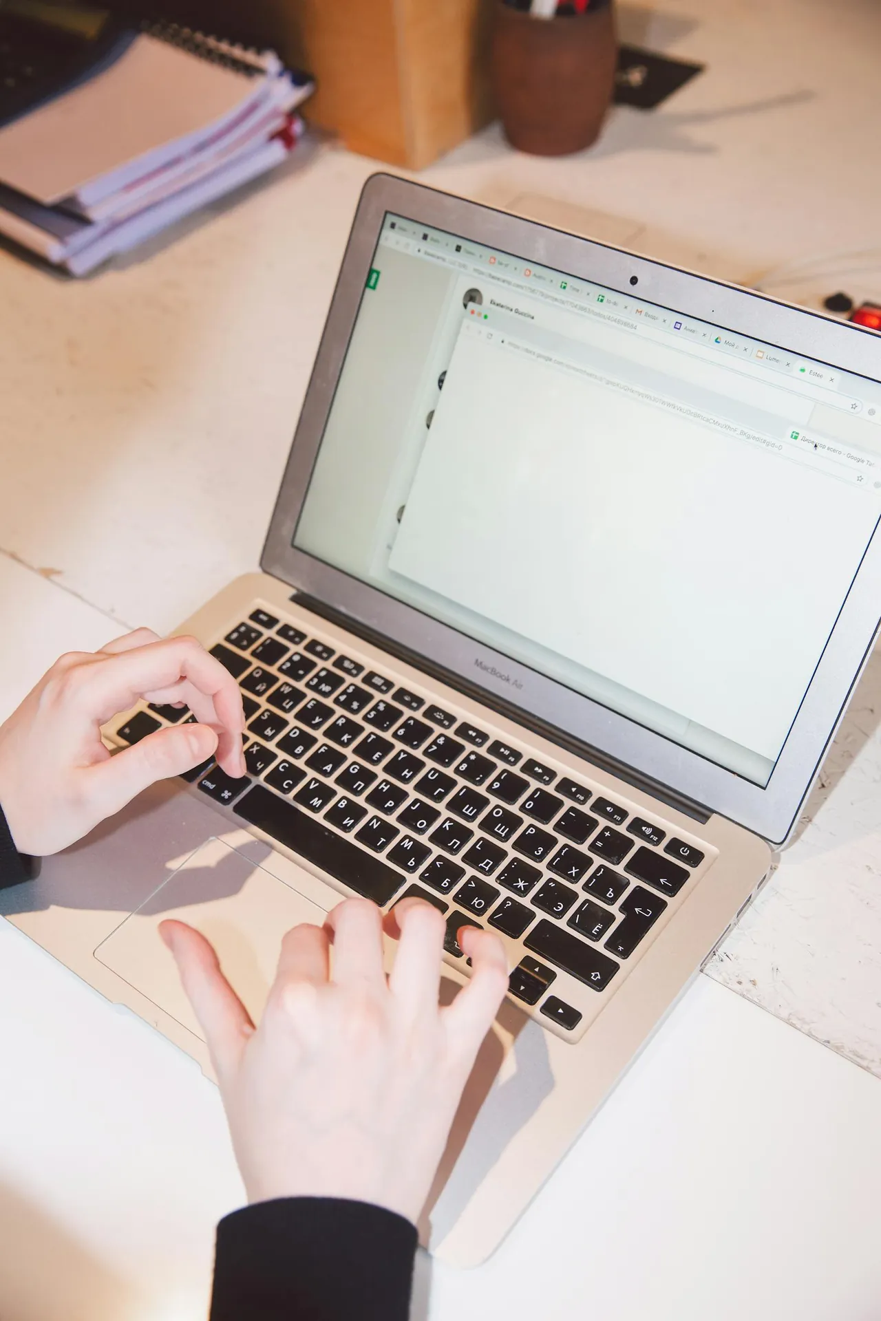 A laptop used for professional email and managing a campsite website